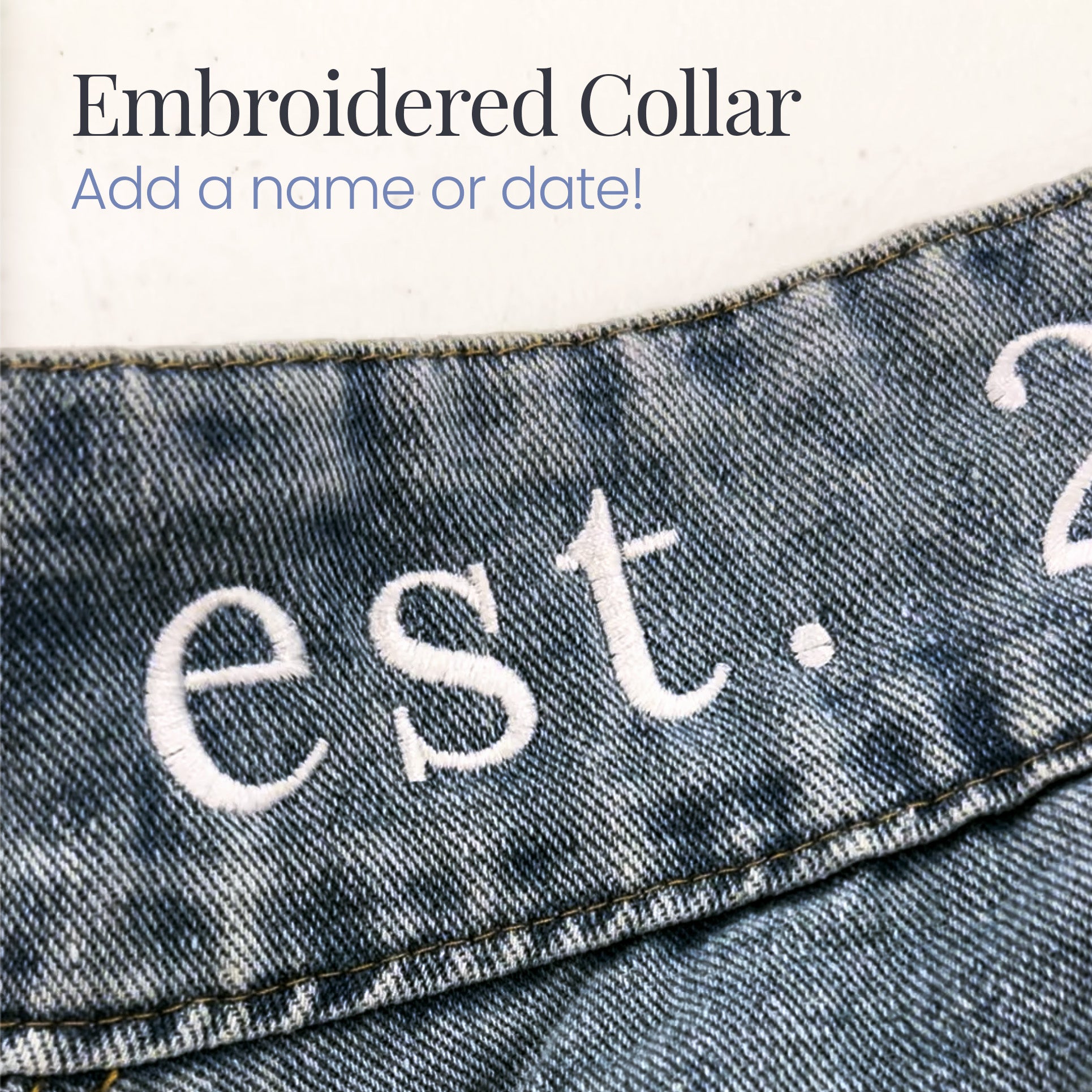 a pair of jeans with the words est 2 embroidered on them