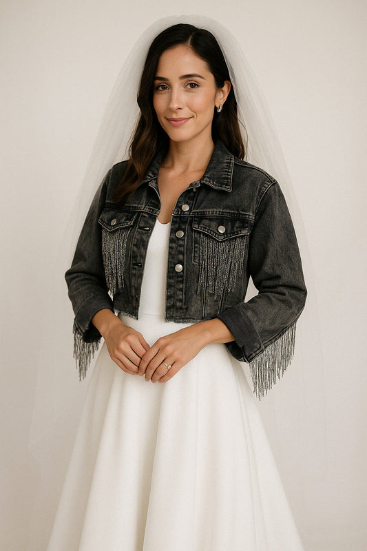 a woman in a white dress and a denim jacket