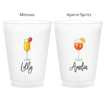 a couple of cups that have drinks in them