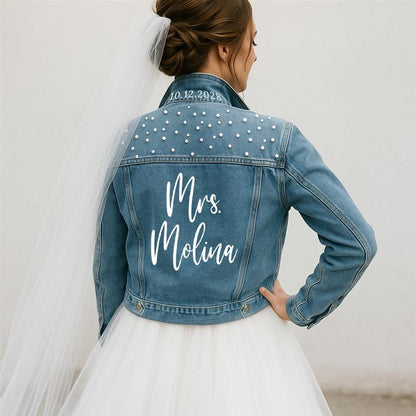 Denim jacket with 'Mrs. Molina' and date on a white background