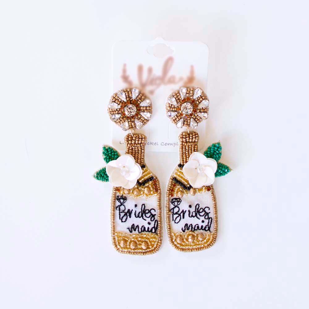 Bridesmaid earrings on their card