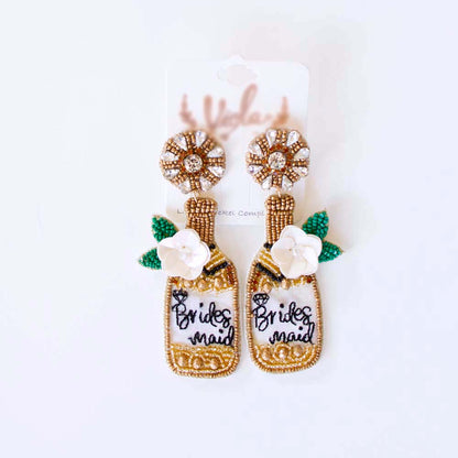 Bridesmaid earrings on their card