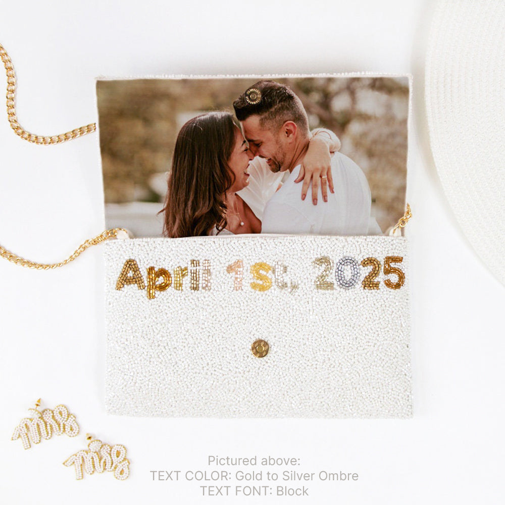 A beaded clutch bag with a custom photo, date, and gold chain.