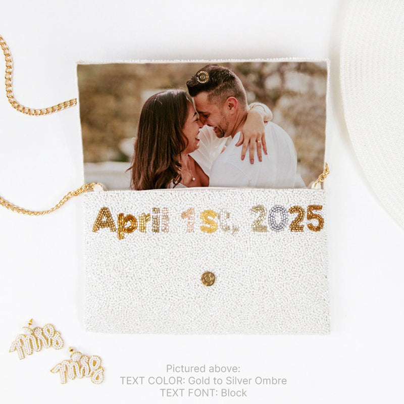 A beaded clutch bag with a custom photo, date, and gold chain.