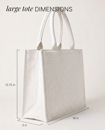 A large white tote bag with measurements provided.