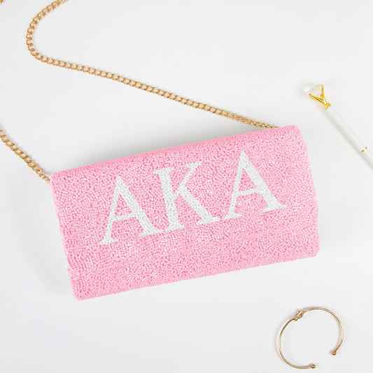 Elegant Personality Sorority Beaded Clutch Bag, handcrafted with intricate detailing, perfect for weddings and special occasions. Features options for gold or silver chain and dimensions of 9.5in x 5in x 3in. Unique customization includes a date on the inside. Each clutch embodies artisanal uniqueness and craftsmanship