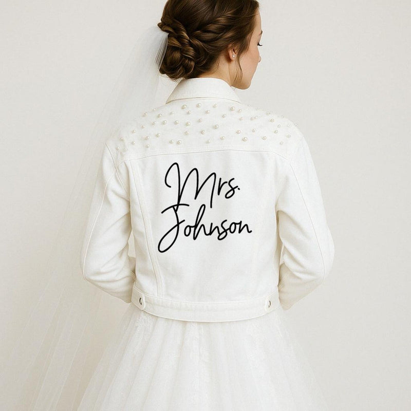 White jacket with 'Mrs. Johnson' text on a plain background