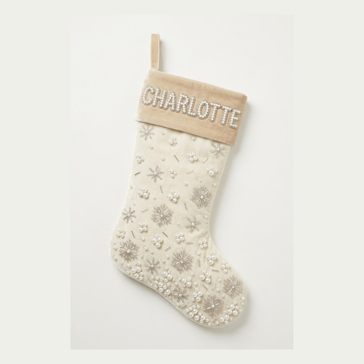 Ivory velvet beaded Christmas stocking with pearl snowfall and name on the champagne cuff