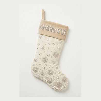 Ivory velvet beaded Christmas stocking with pearl snowfall and name on the champagne cuff