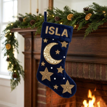 Midnight velvet starlight stocking hanging on a mantel