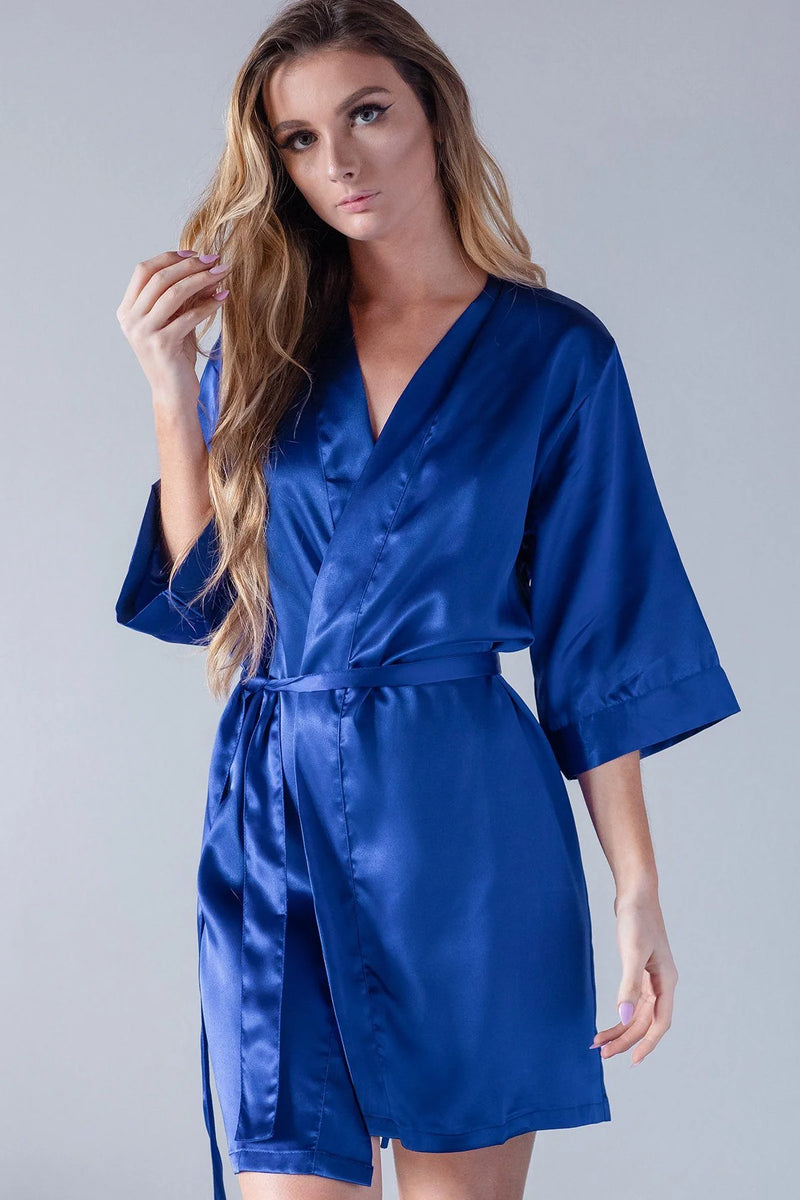 Woman modeling personalized royal blue satin kimono bridesmaid robe with tie waist — custom bridal party getting-ready robe