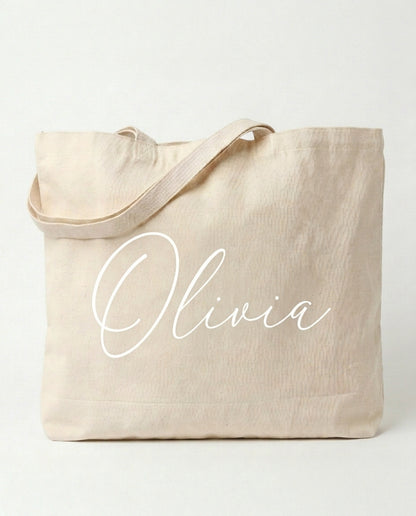 Natural canvas tote with her name in white script
