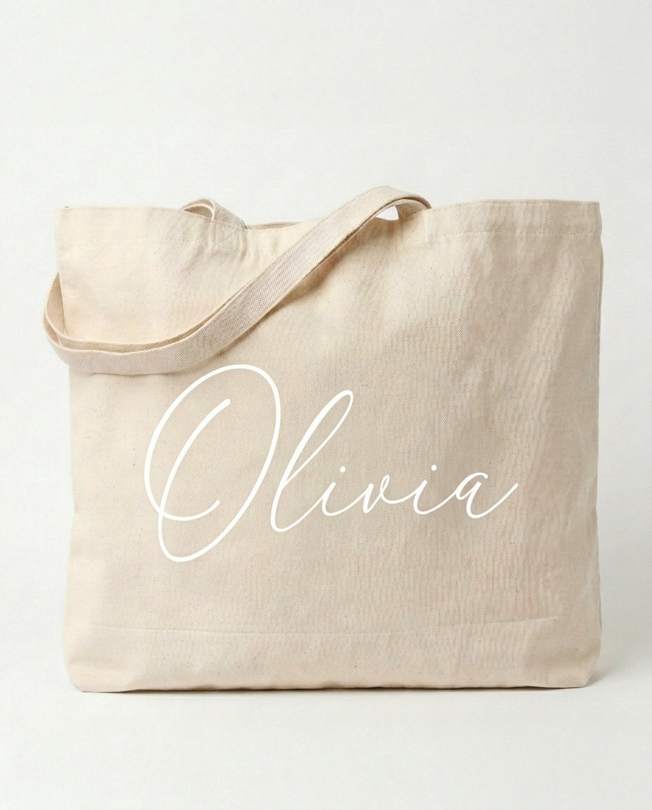 Natural canvas tote with her name in white script