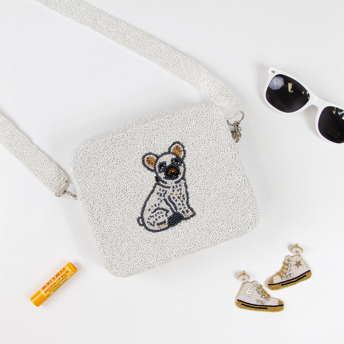 Customizable beaded crossbody bag with a unique design, perfect for summer outings. Features a removable 46-inch beaded strap and zipper closure. Handcrafted ensuring each piece's individuality in color, texture, and beadwork.
