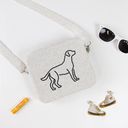 Customizable beaded crossbody bag with a unique design, perfect for summer outings. Features a removable 46-inch beaded strap and zipper closure. Handcrafted ensuring each piece's individuality in color, texture, and beadwork.