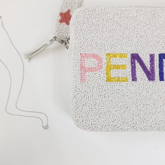 Handcrafted Personalized Hat Beaded Crossbody Bridal Clutch measuring 8in x 8in x 2in with a zipper closure. Features a 46in removable beaded strap, offering versatility in style. Ideal for summer outings or special occasions, this unique clutch showcases artisanal charm and can be a memorable gift for loved ones, especially brides.