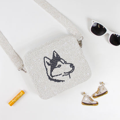 Customizable beaded crossbody bag with a unique design, perfect for summer outings. Features a removable 46-inch beaded strap and zipper closure. Handcrafted ensuring each piece's individuality in color, texture, and beadwork.