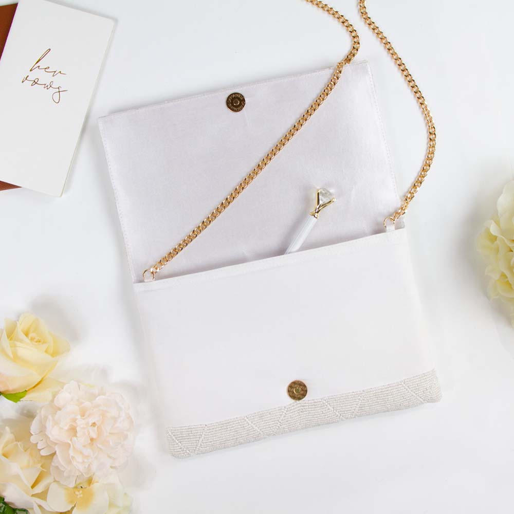 Vibrant Bridal Clutch: Multi-colored Bride Clutch Bag, crafted from durable canvas with magnetic snap closure. This hand-beaded bridal purse is both stylish and functional, offering a unique and personalized touch for brides on their special day.