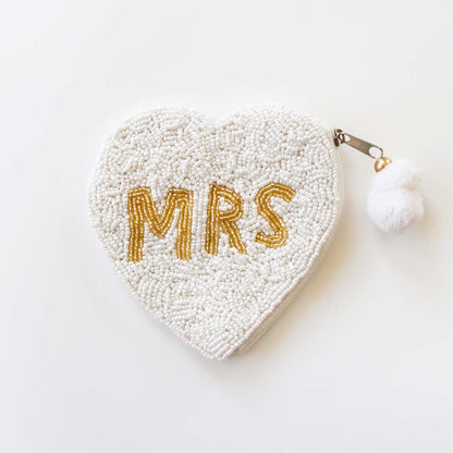 Exquisite Mrs. Coin Bridal Clutch, hand-beaded to perfection in a blend of matte white and shimmering gold. Ideal for weddings and special occasions, this durable canvas purse with a secure zipper elegantly complements any outfit. A perfect keepsake or gift for brides, capturing the uniqueness of artisanal craftsmanship.