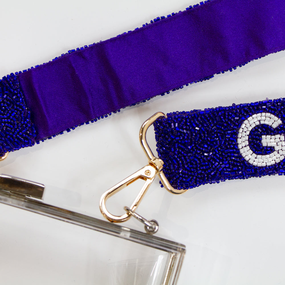 Customizable 46in crossbody beaded strap, perfect as a trendy Bridal Clutch strap, guitar strap, or camera strap. Available in both neutral and bright color palettes, this handmade strap is unique in its variations of color, shading, and beadwork. A versatile accessory that can elevate your game day bag or serve as a memorable bridal gift with personalized name details