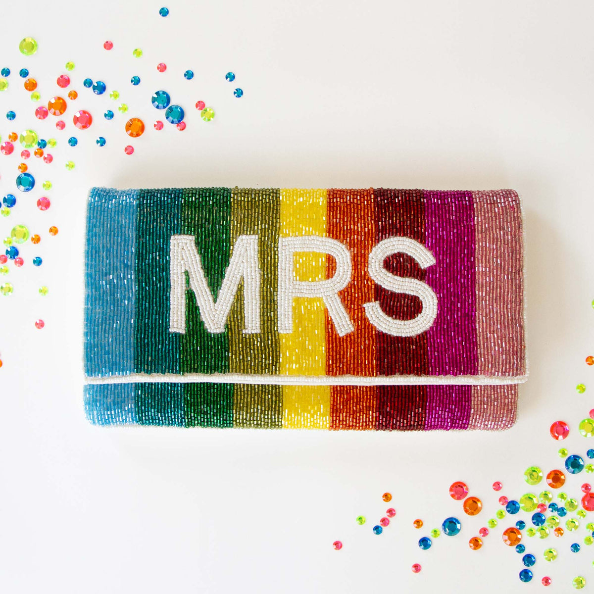 Stunning Bridal Clutch: Mrs. Rainbow Clutch Bag measuring 5.75 x 10.25 x 1 in, crafted from durable canvas. This handmade, beaded bridal purse boasts an intricate design, making it an elegant accessory for brides seeking a one-of-a-kind touch for their special day.