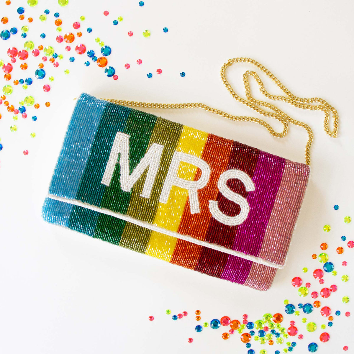 Stunning Bridal Clutch: Mrs. Rainbow Clutch Bag measuring 5.75 x 10.25 x 1 in, crafted from durable canvas. This handmade, beaded bridal purse boasts an intricate design, making it an elegant accessory for brides seeking a one-of-a-kind touch for their special day.