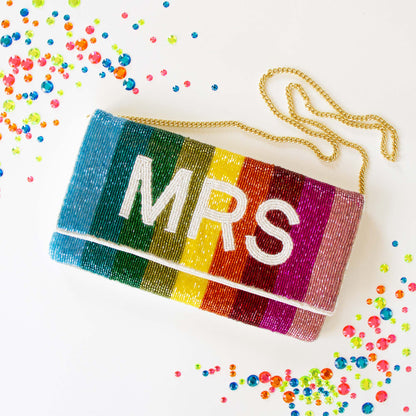 Stunning Bridal Clutch: Mrs. Rainbow Clutch Bag measuring 5.75 x 10.25 x 1 in, crafted from durable canvas. This handmade, beaded bridal purse boasts an intricate design, making it an elegant accessory for brides seeking a one-of-a-kind touch for their special day.